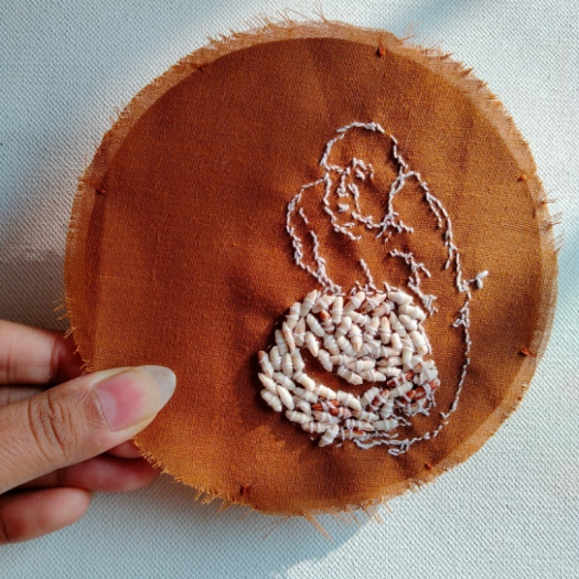 Detail: Installation _ ‘Seed, Soul, Soil’ _ Thread & Rice seed on cotton fabric, Rice Paddy _ 2021